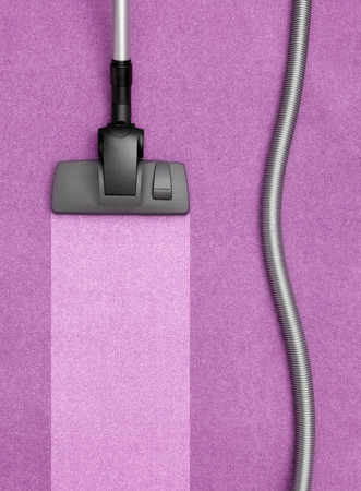 Vacuum Cleaner cleaning the carpetの写真素材