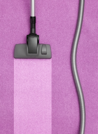 Vacuum Cleaner cleaning the carpetの写真素材