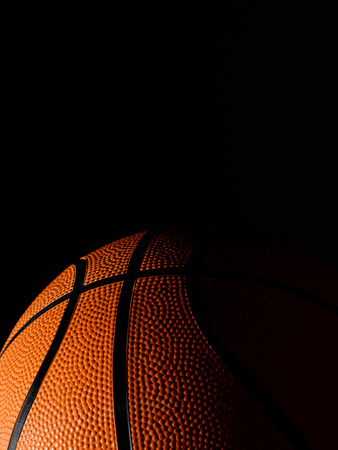 Single Basketball on a black backgroundの写真素材