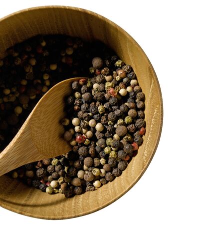 Mixed Peppercorns isolated in a bowlの写真素材