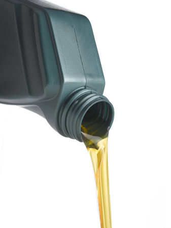 Oil can pouringの写真素材