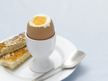 Boiled Egg on Blue tableclothの写真素材
