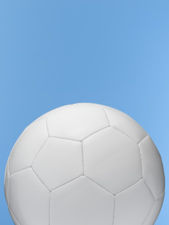 Soccer Ball isolated on blueの写真素材