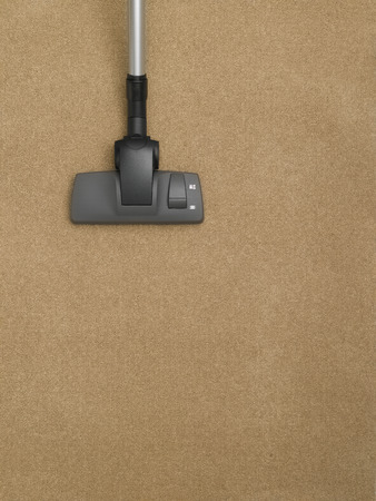 Vacuum Cleaner cleaning the carpetの写真素材