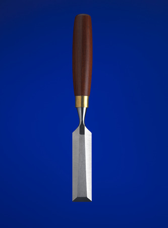 Chisel with a blue backgroundの写真素材
