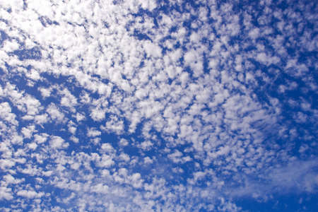 Clouds and a deep blue skyの写真素材
