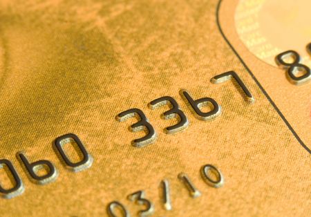 Macro shot of a gold credit cardの写真素材