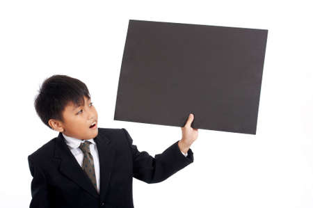 young businessman in black suit holding placardの写真素材