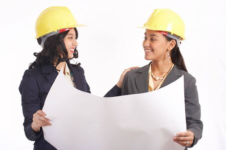 female architects working on their floor planの写真素材