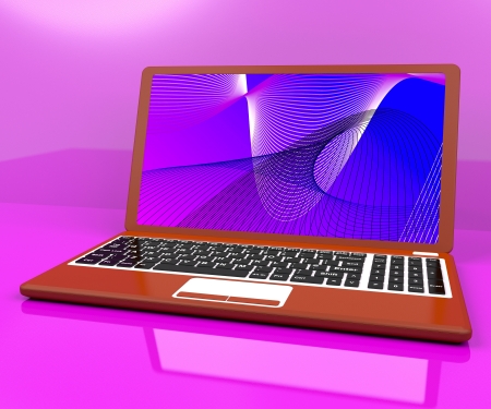 Red Computer On A Desk With Spiral Patternの写真素材