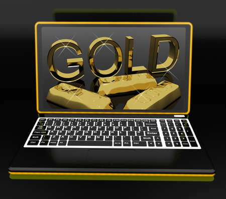 Gold On Laptop Showing Treasury And Fortuneの写真素材