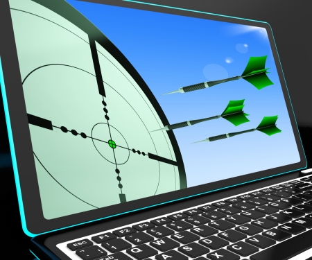 Arrows Aiming On Laptop Shows Perfect Strategies And Accurate Shootの写真素材