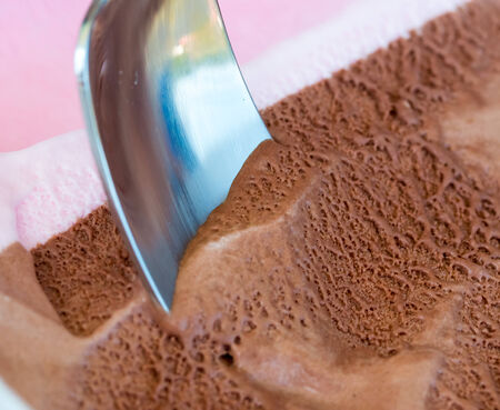 Chocolate Ice Cream Showing Frozen Gelato And Scoop