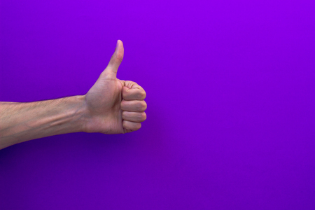 Thumbs up, like a signの写真素材