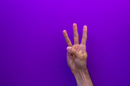 Set of counting hands isolated on nice paper purple background for blog or site left handの写真素材