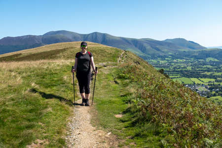 Solo female walker in the mountains.の写真素材