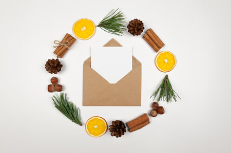 Christmas composition, circle, dried orange slices, fir tree branches, cinnamon sticks, pine cones,...