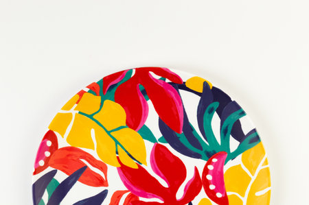 Top view of colorful plate on white background. Exotic plant plate, summer picnic. Flat lay, copy...