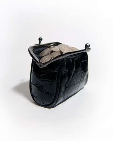A photo of black women coin purse full of coinsの写真素材