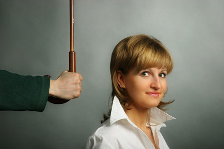 Young business woman under cover. Safety concept
