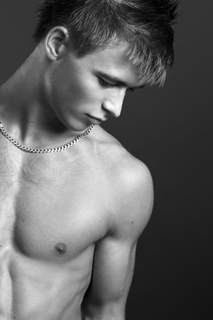 Handsome young man with athletic bodyの写真素材