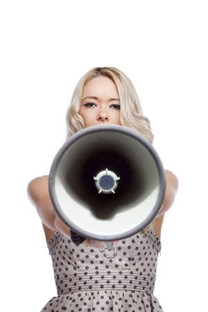 Young blonde woman  with megaphoneの写真素材