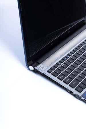 Stylish thin laptop on white background with large place for your text.の写真素材