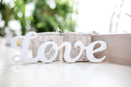 Word Love on the table in summer cafeの写真素材