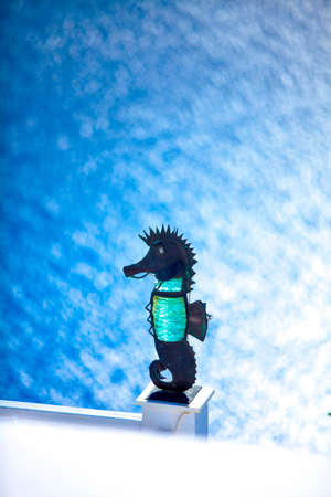 Sea Horse Street Lamp against the see. Santorini island, Greeceの写真素材
