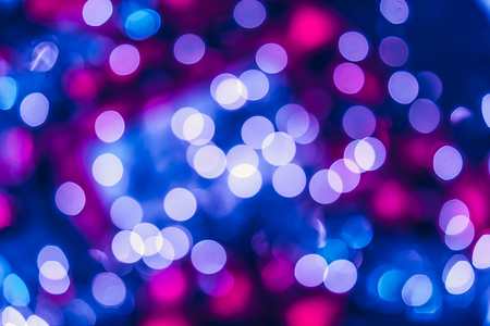 Christmas lights bokeh background. Blue, white and res coloursの写真素材