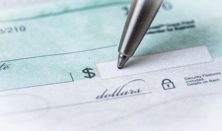 Making payments , writing the checkの写真素材