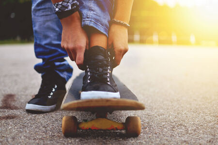 woman with the skateboard, close upの写真素材