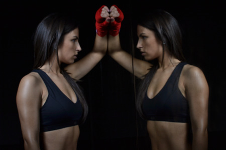  beautiful fitness woman with the red boxing bandageの写真素材