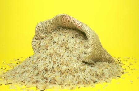 rice in small burlap bagの写真素材