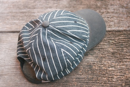 sports cap on the old boardの写真素材