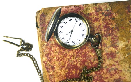 watch on old book isolatedの写真素材