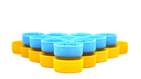 colorful plastic bottle caps isolated