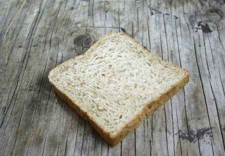 wheat bread on wooden