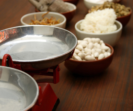 Chinese herbal medicine on woodenの写真素材