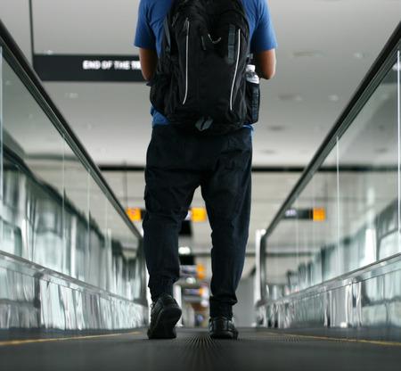 Pedestrian walking with zooming motion blurの写真素材