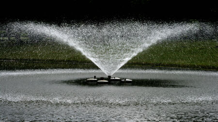 small fountain in the parkの写真素材