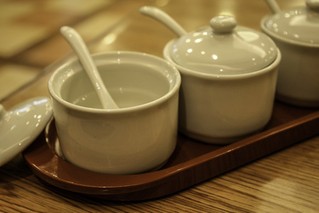 blank white cup of condiment ceramic setの写真素材