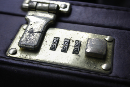 old suitcase lock with code numbers