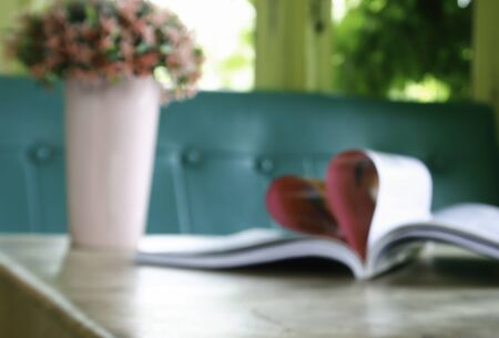 Heart from book pages in blurredの写真素材