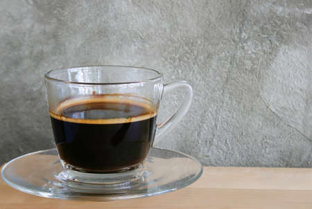 black coffee on a wood tableの写真素材