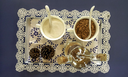 white and brown sugar with honeyの写真素材