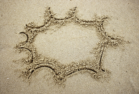 a blank bubble drawn on the sand as a backgroundの写真素材