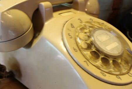 old telephone with rotary dialの写真素材
