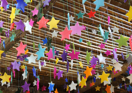 Colorful candles star hangingの写真素材