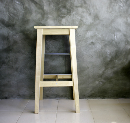 chair with old wallの写真素材
